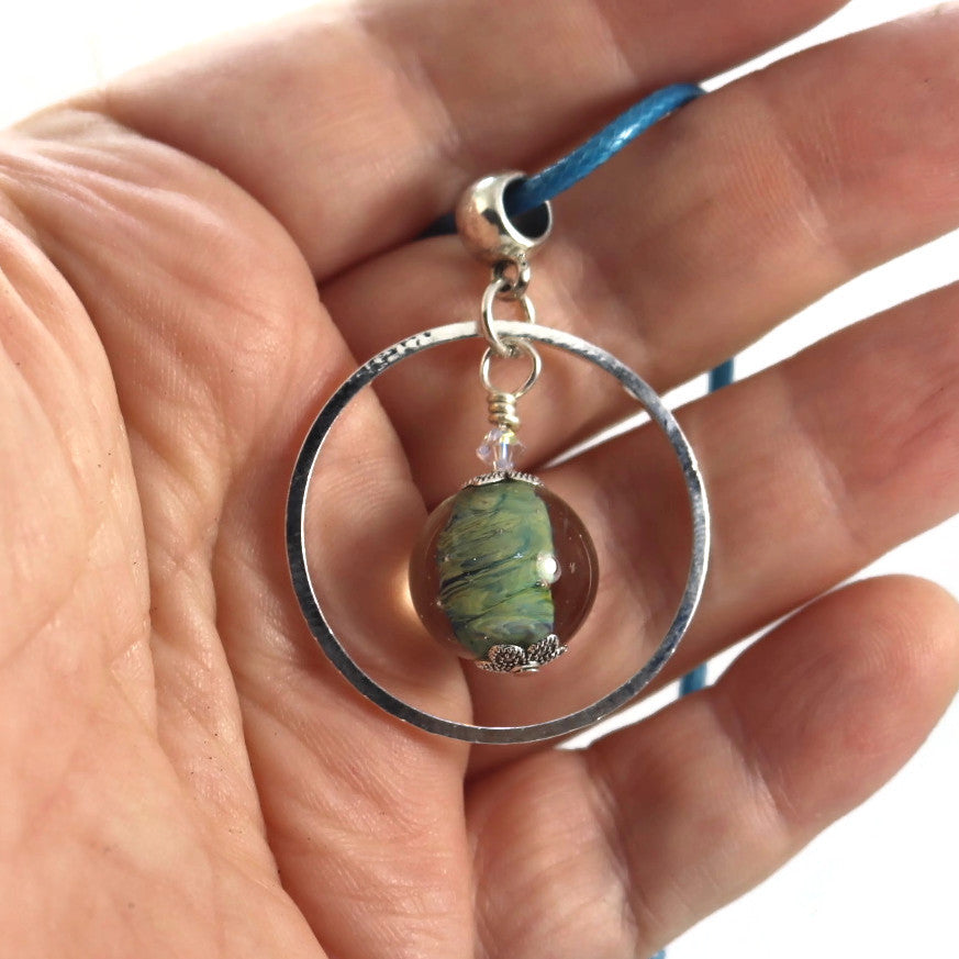 Ocean Swirl Glass Pendant Necklace – Sterling Silver Circle Frame