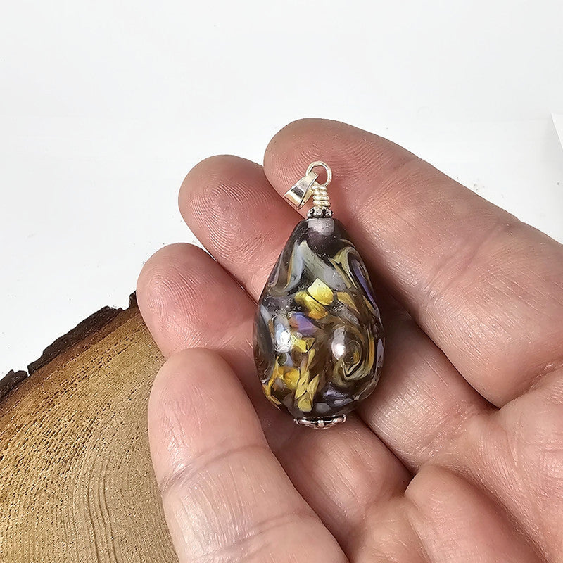 Unique layered egg pendant